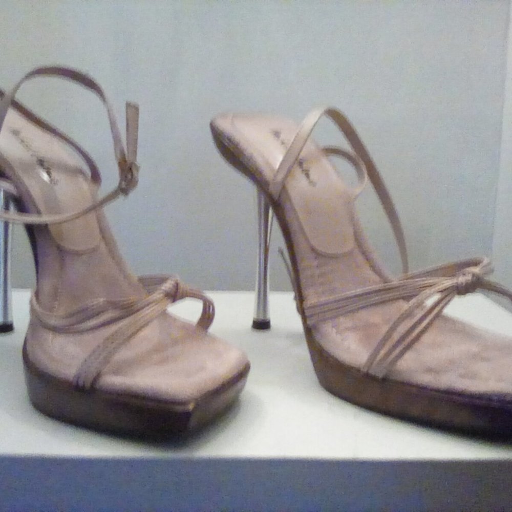 Unworn ankle strap knot tie top. Cream color. Square toes. Silver heels!